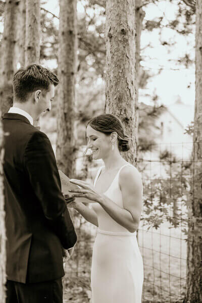 Bride and groom private vow ceremony outdoors in the woods